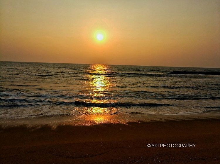 a golden sunset at kalutara beach