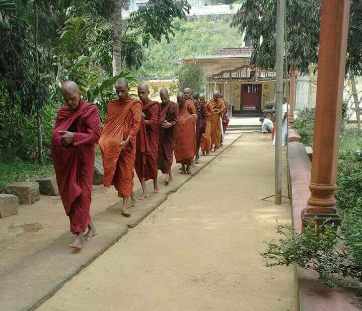 monks walking in kalugala monastery